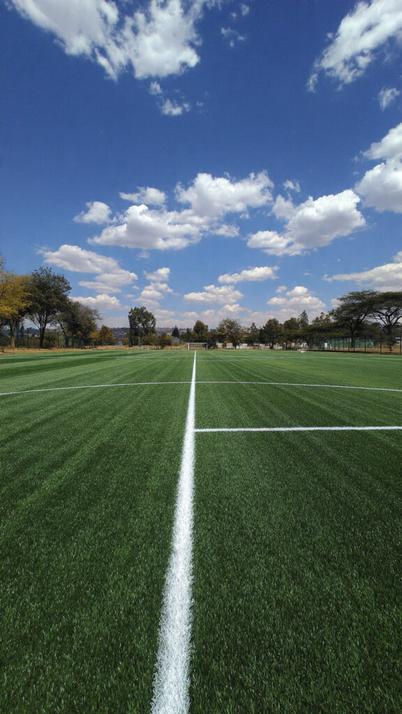 artificial turf solutions for high-traffic sports facilities, durable synthetic grass football rugby fields Zimbabwe, FIFA certified artificial turf installation Zimbabwe, weather-resistant all-season sports surfaces, cost-effective artificial grass sports infrastructure, professional artificial turf installation Southern Africa, UV-resistant sports turf African climate, water-saving artificial grass sports facilities, premium sports turf systems ZimbabweLawnKing artificial grass, sports turf suppliers South Africa, artificial grass installation services, professional turf contractors, sports facility specialists